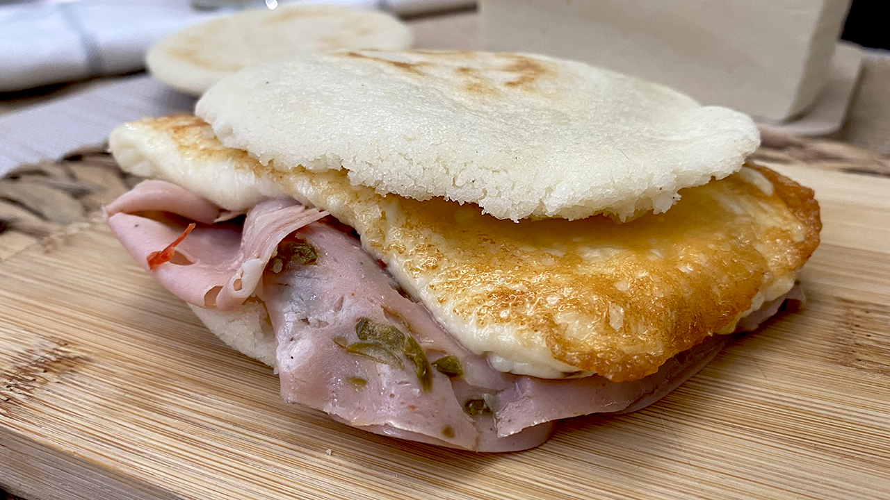 Mortadella and cheese arepa