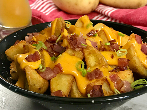 Potato wedges with cheese and bacon